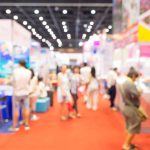 Abstract blurred event exhibition with people background, business convention show concept.